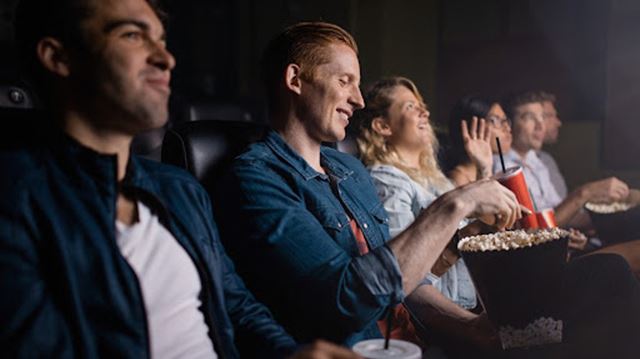People laughing in cinema